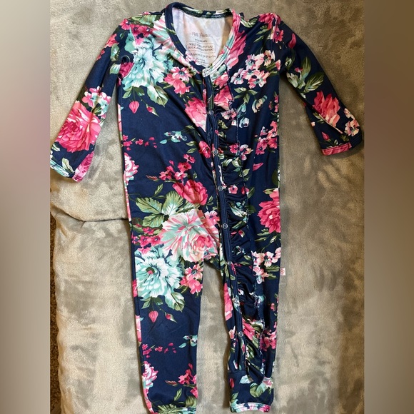 Posh Peanut Other - Navy floral Posh Peanut snap ruffle romper